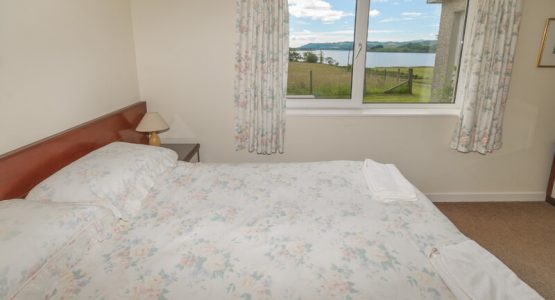 View from master bedroom over Loch Awe bedroom with loch view
