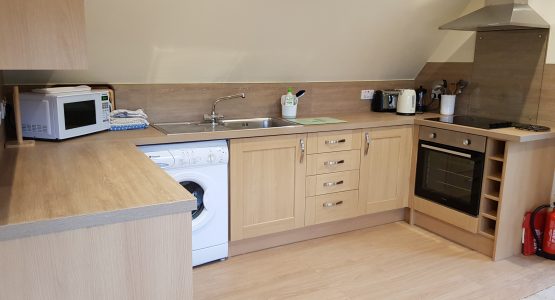 Barn Kitchen wood effect kitchen with appliances